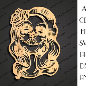 May include: A wood cutout of a woman's face with a sugar skull design. The woman has long, flowing hair and a rose in her hair. The sugar skull design is intricate and detailed, with black eyes and a black mouth.
