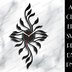 May include: Black clock with a stylized floral design. The clock face is black with white hands and gold accents. The clock is designed to be cut out of wood or metal.