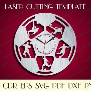 May include: A silver metal clock with a soccer ball design. The clock face is surrounded by six soccer players in silhouette. The clock hands are black and red. The text "LASER CUTTING TEMPLATE" is at the top of the image. The text "AI CDR EPS SVG PDF DXF PNG" is at the bottom of the image.