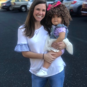Cabbage patch inspired kids long hair hat. Picture courtesy of Ashley and her beautiful baby girl.