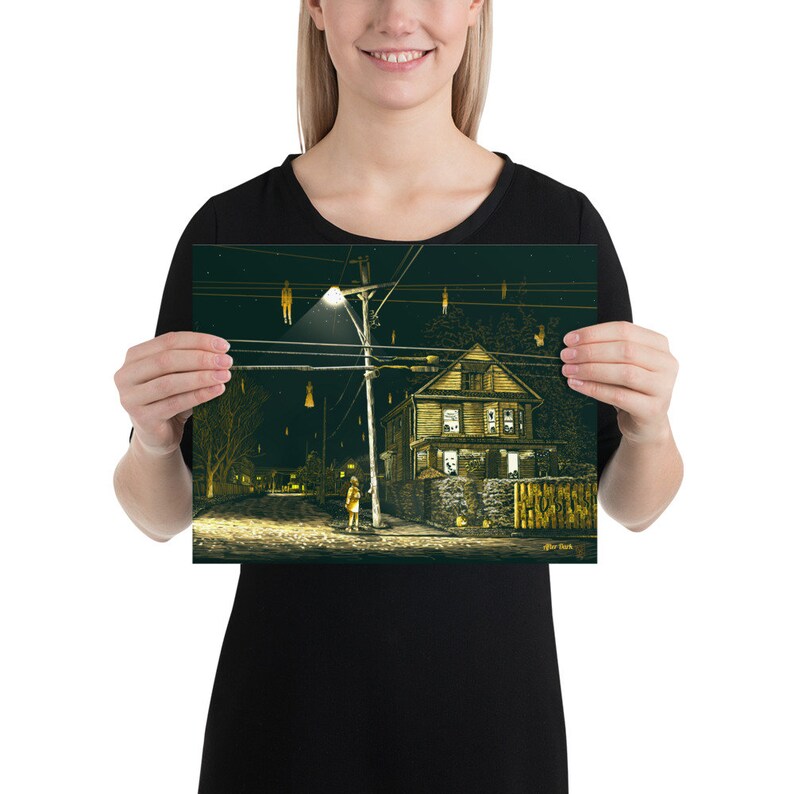 May include: A digital illustration of a house at night with a streetlight and several figures hanging from power lines. The figures are all wearing white and are silhouetted against the dark sky. The house is a two-story structure with a porch and a fence. The street is empty except for a single figure standing in the foreground.
