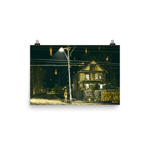 May include: A black and white illustration of a house with a streetlight and figures hanging from power lines. The figures are dressed in white and appear to be floating in the air. A person in yellow clothing stands on the sidewalk in front of the house.