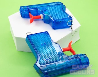 Pendientes de pistola de agua - Pistola neón verde amarillo Kidcore Raver gran tamaño llamativo Clubkid transparente Y2K Kitsch arma Super Soaker