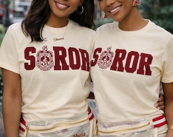 Cream short sleeve t-shirt with Crimson Soror patch