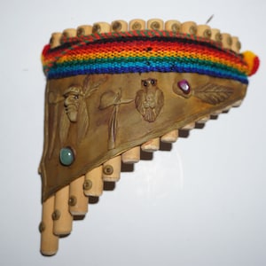 Bamboo flute / Flute with decoration and stones / musical instrument