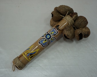 A Bamboo Stick Maraca made by Tree Nut Shells -Nut shells maraca-Handicraft