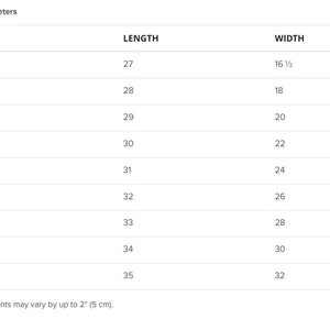 May include: Size chart showing length and width measurements in inches for sizes XS to 5XL.  Measurements are listed in a table format.