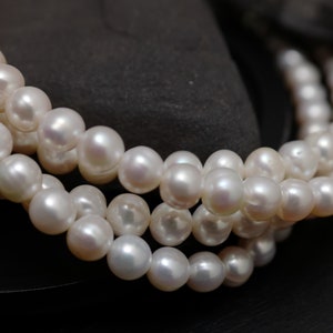 White Freshwater Pearl Beads: Off Round, High Luster, 7.5-8.5mm Strand