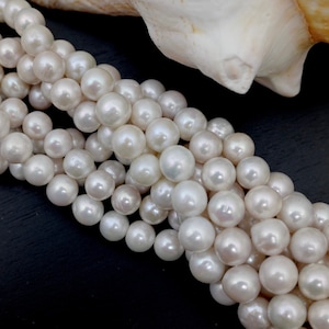 Ivory Edison Pearl Strand: 9-11mm Round Freshwater Pearls