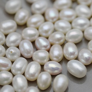 5 AAA White Freshwater Pearls: Half Drilled Oval Rice Beads (6-6.5 x 7-8mm)