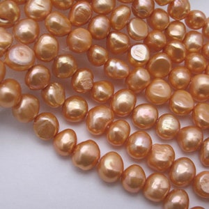 Orange Freshwater Pearl Strand: 7-8mm Potato Nugget Beads