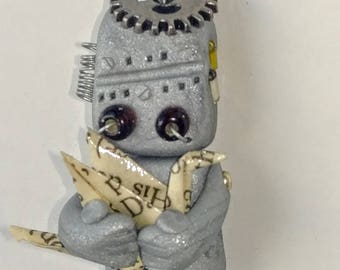 polymer clay robot ornament with origami crane