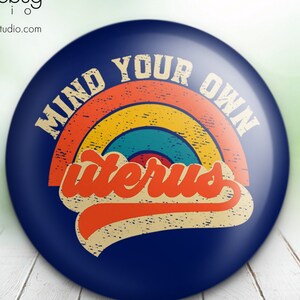 Retro Mind Your Own Uterus Orange with Blue Background - Button Pin