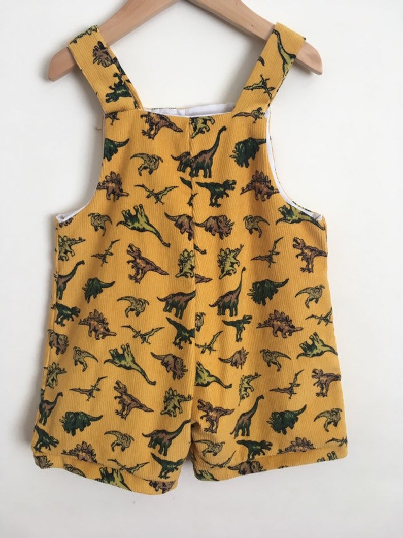 dinosaur dungaree dress