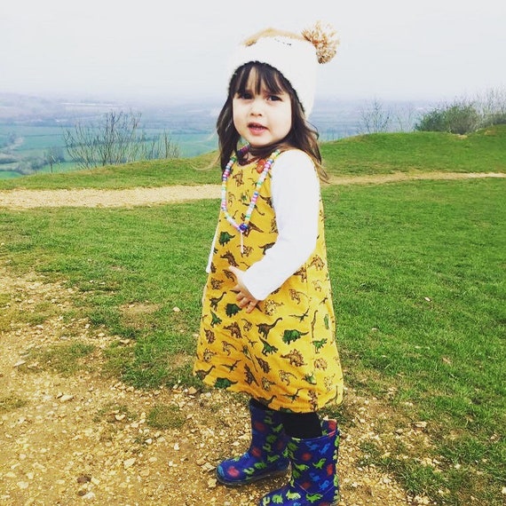 dinosaur pinafore dress