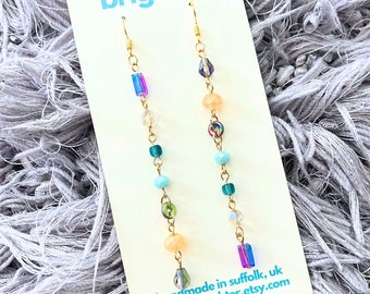 Colourful shoulder duster earrings | Extra long mismatched earrings | Gold plated dangles with glass beads | Handmade chain earrings