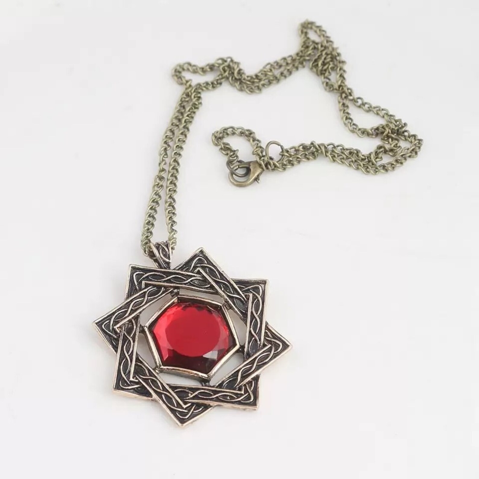 кулон акатоша. значок скайрима кулон. кулоны из игр. кулон игра. Skyrim подвеска.