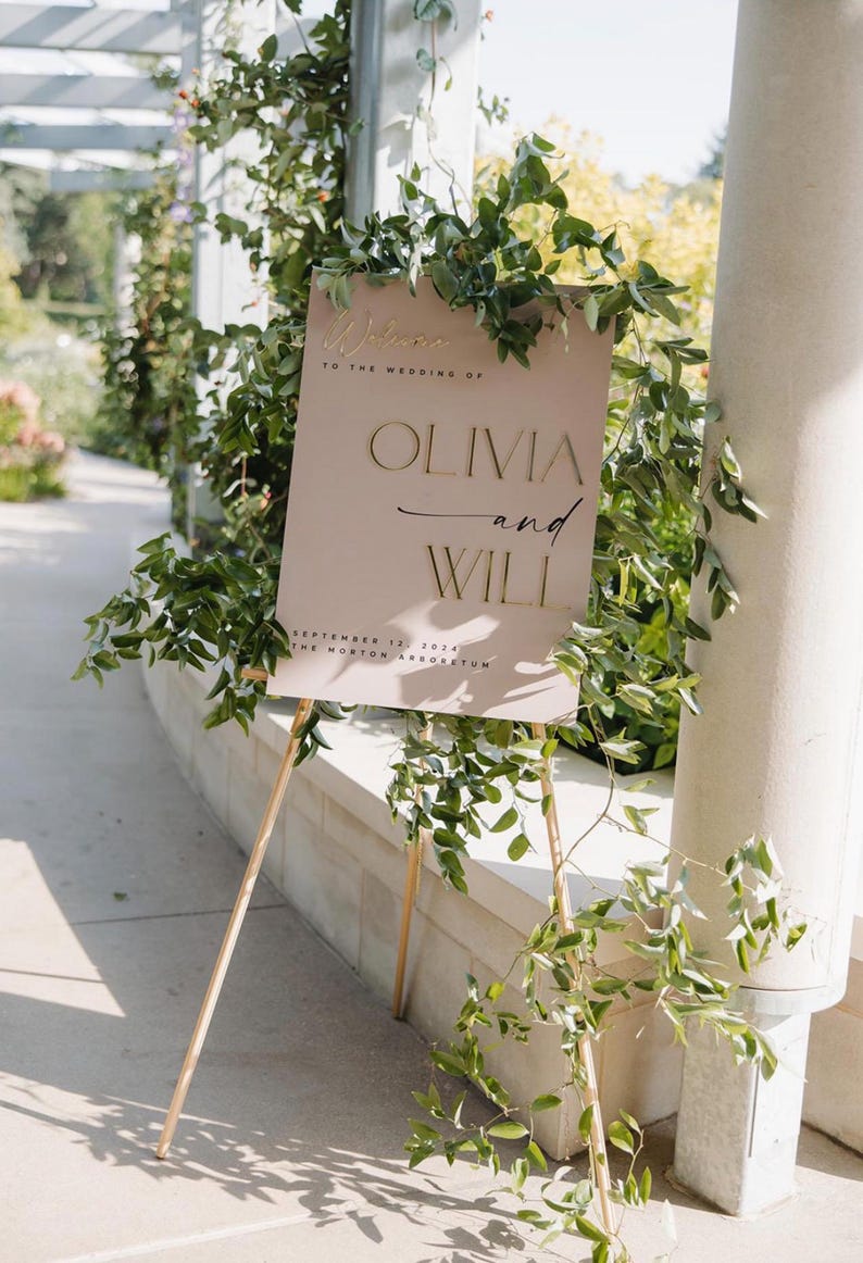 Luxury Acrylic Wedding Welcome Sign. Mix of 3D Mirror detailing and UV print. Made from premium UK fabricated acrylic. 12 bespoke colours to rose signage co. Comes in 3 size options. Customised to your style and wording.