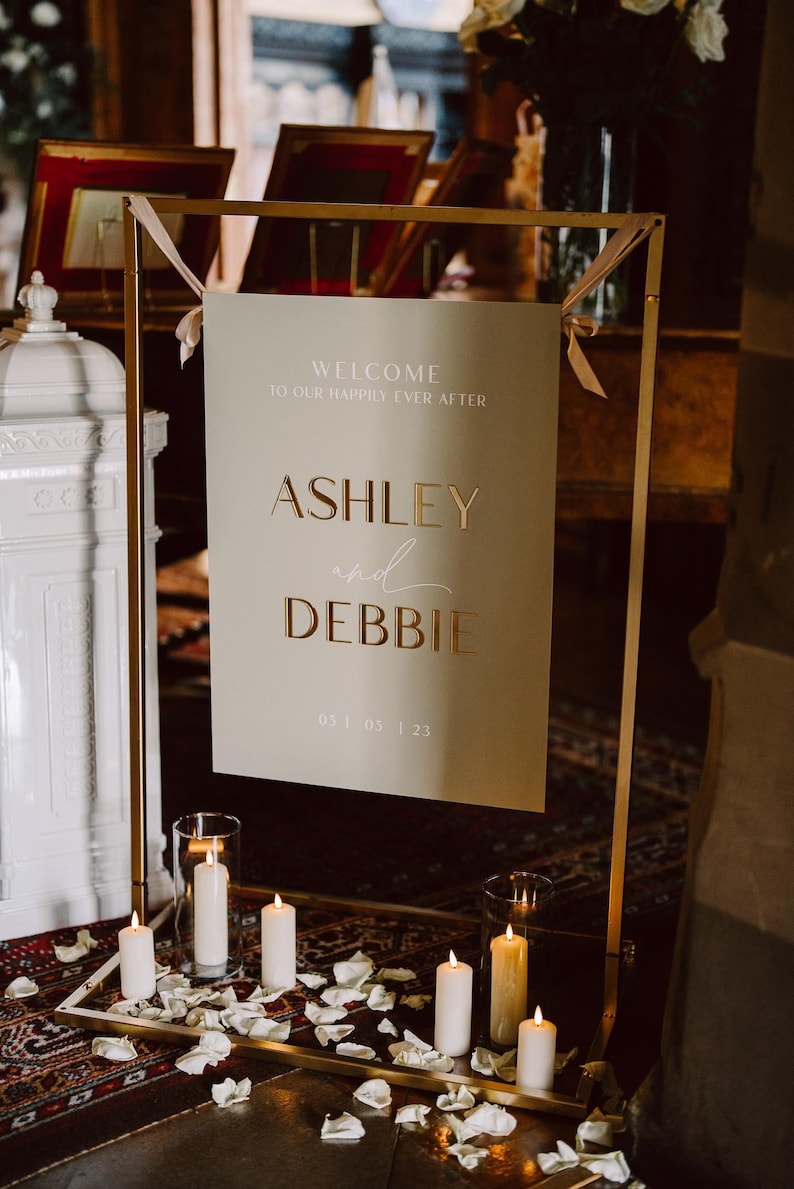 Luxury Acrylic Wedding Welcome Sign. Mix of 3D Mirror detailing and UV print. Made from premium UK fabricated acrylic. 12 bespoke colours to rose signage co. Comes in 3 size options. Customised to your style and wording.