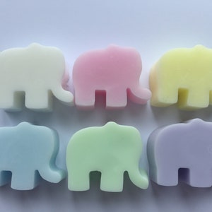May include: Six small elephant-shaped soaps in different pastel colours: white, pink, yellow, light blue, green, and lavender.