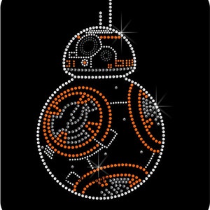 May include: BB-8 droid design made of white, orange, and silver rhinestones on a black background. The design features a round body and a domed head, with intricate patterns created by the placement of the rhinestones. The image has a sparkling effect.