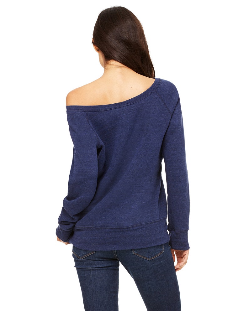 May include: A navy blue off-the-shoulder sweatshirt with long sleeves and a relaxed fit.