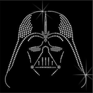 May include: A black and white rhinestone design of Darth Vader's helmet and face. The design is made up of small, round rhinestones.