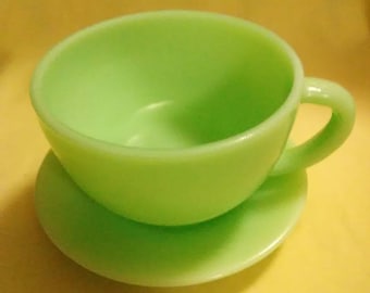 Vintage jadite coffee cup and saucer. Clean, never used, no stains.