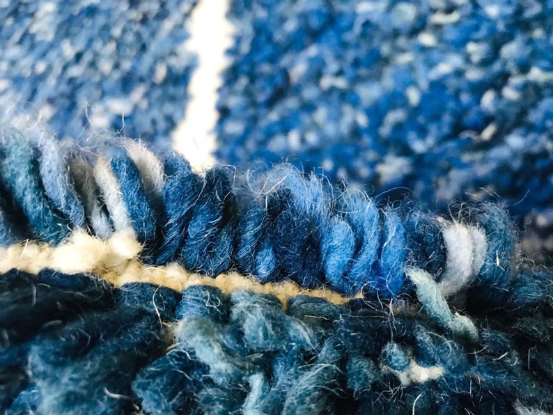 This custom Beni ourain rug has been handmade in Morocco with natural wool sheep. This Beni ourain rug is so soft, thick, and fluffy. That makes sitting so comfortable, and this Berber carpet will also warm you during winter.