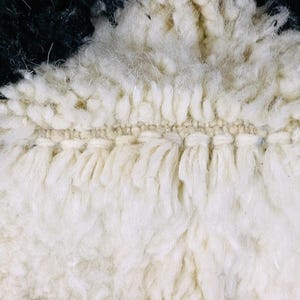 One-of-a-kind Berber rug showcasing traditional Moroccan artistry.