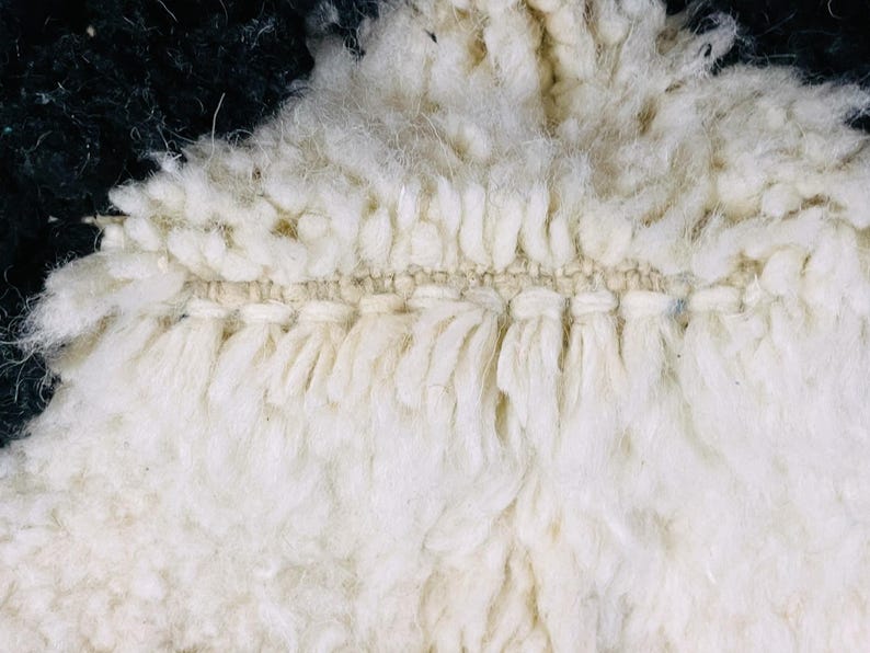 One-of-a-kind Berber rug showcasing traditional Moroccan artistry.