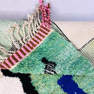 Stylish Moroccan rug with intricate handwoven patterns.