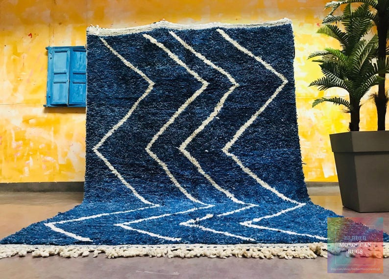 This custom Beni ourain rug has been handmade in Morocco with natural wool sheep. This Beni ourain rug is so soft, thick, and fluffy. That makes sitting so comfortable, and this Berber carpet will also warm you during winter.