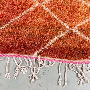 Moroccan handcrafted rug with a bold, vibrant color palette.