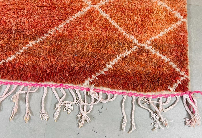 Moroccan handcrafted rug with a bold, vibrant color palette.