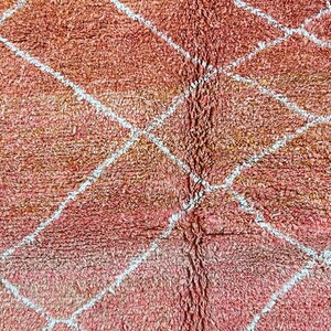 Artistic Moroccan area rug featuring traditional craftsmanship.