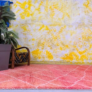 Luxurious Moroccan wool rug adding warmth and texture to interiors.