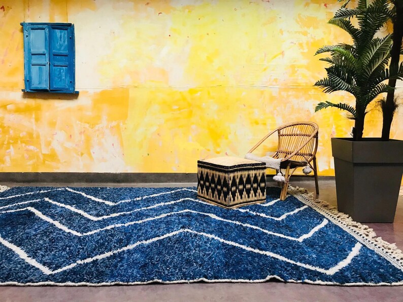 This custom Beni ourain rug has been handmade in Morocco with natural wool sheep. This Beni ourain rug is so soft, thick, and fluffy. That makes sitting so comfortable, and this Berber carpet will also warm you during winter.