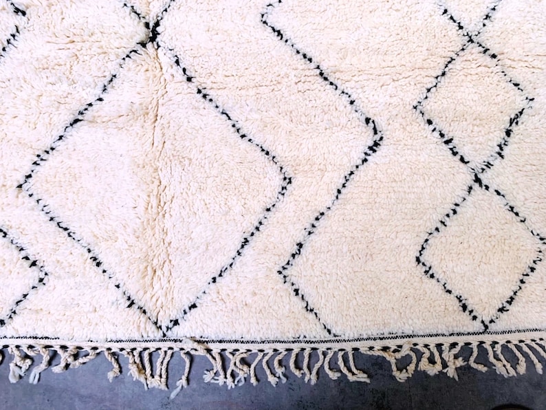 Beni ourain,	
Beni ourain rug,	
handmade rug,	
Moroccan rug,	
Tapis berbere,	
Berber carpet,	
Wool rug,	
Area rug,	
beni ouarain,	
Morocco rug,	
Large rug,	
Small rug,	
Checkered rug,
