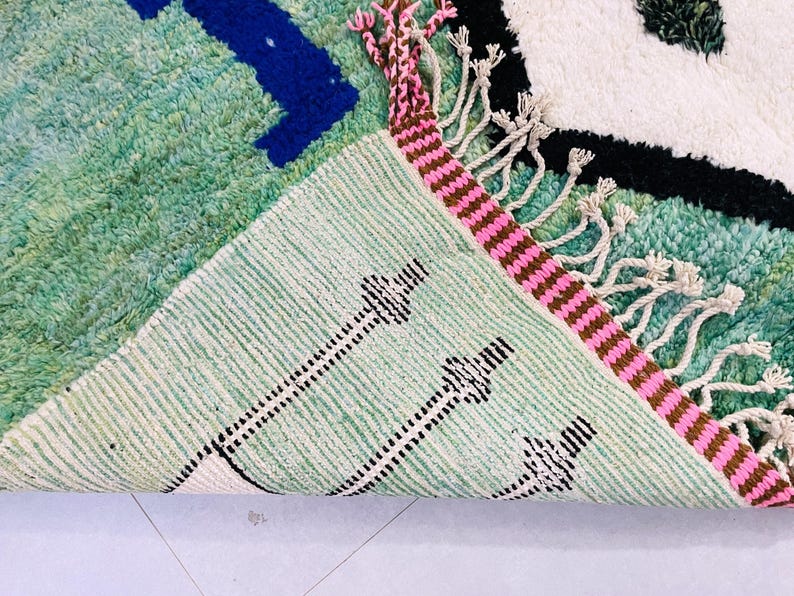 Vibrant Moroccan wool rug, ideal for statement home styling.