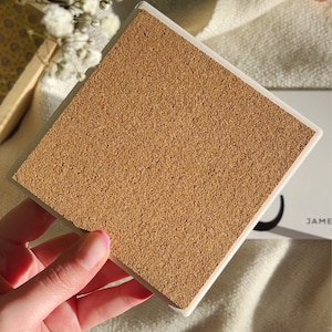 cork backing on a square ceramic coaster