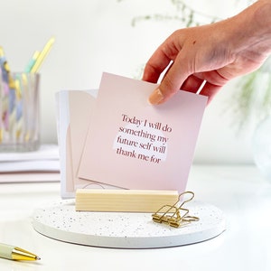 choosing a positive quote card to display for the day ahead