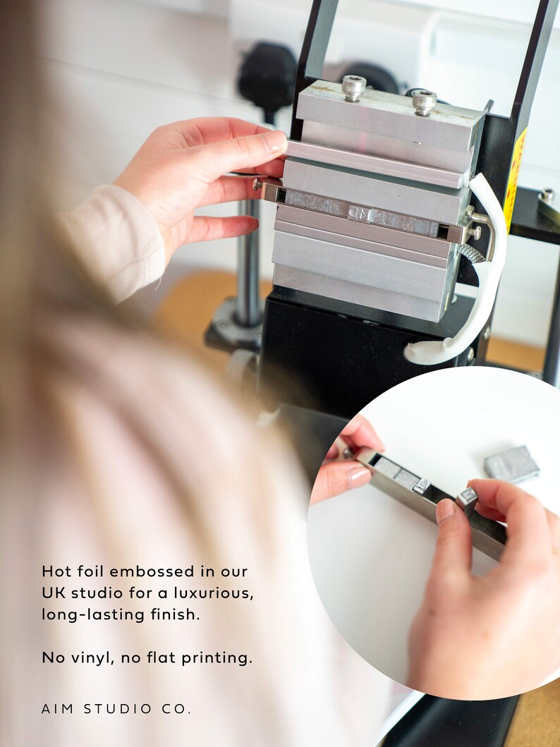 Behind the scenes process of making a letters to the bride scrapbook using a hot foil embossing machine to add custom text and personalised wedding date to the scrapbook cover.