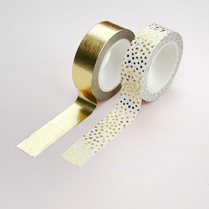 a set of 2 gold foiled washi tapes to use in personalised scrapbook