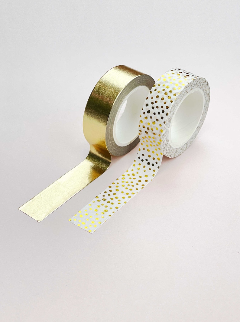 a set of 2 gold foiled washi tapes to use in personalised scrapbook