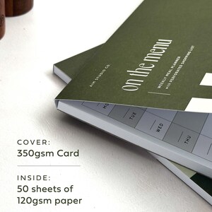 close up of green a4 notepad cover reading "on the menu" in white text. Descriptive text reads: cover, 350gsm card, inside: 50 sheets of 120gsm paper.