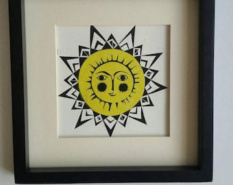 Sun print. Handmade linoprint of sun in chartreuse yellow and black. Midcentury style.