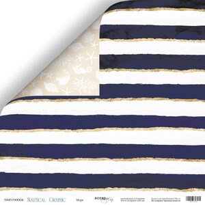 May include: A sheet of scrapbook paper with a nautical theme. The paper features a blue and white striped pattern with gold accents. The paper is decorated with a variety of sea-themed images, including seashells, starfish, and seahorses.