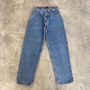 May include: Light blue denim jeans with a high waist and a relaxed fit. The jeans feature a classic five-pocket design, a button and zip closure, and belt loops. The denim has a medium wash with subtle fading.