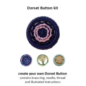 May include: A Dorset Button kit featuring a navy blue button with a pink centre, and three smaller buttons below. The text "Dorset Button kit" is at the top. The kit includes a brass ring, needle, thread, and instructions.